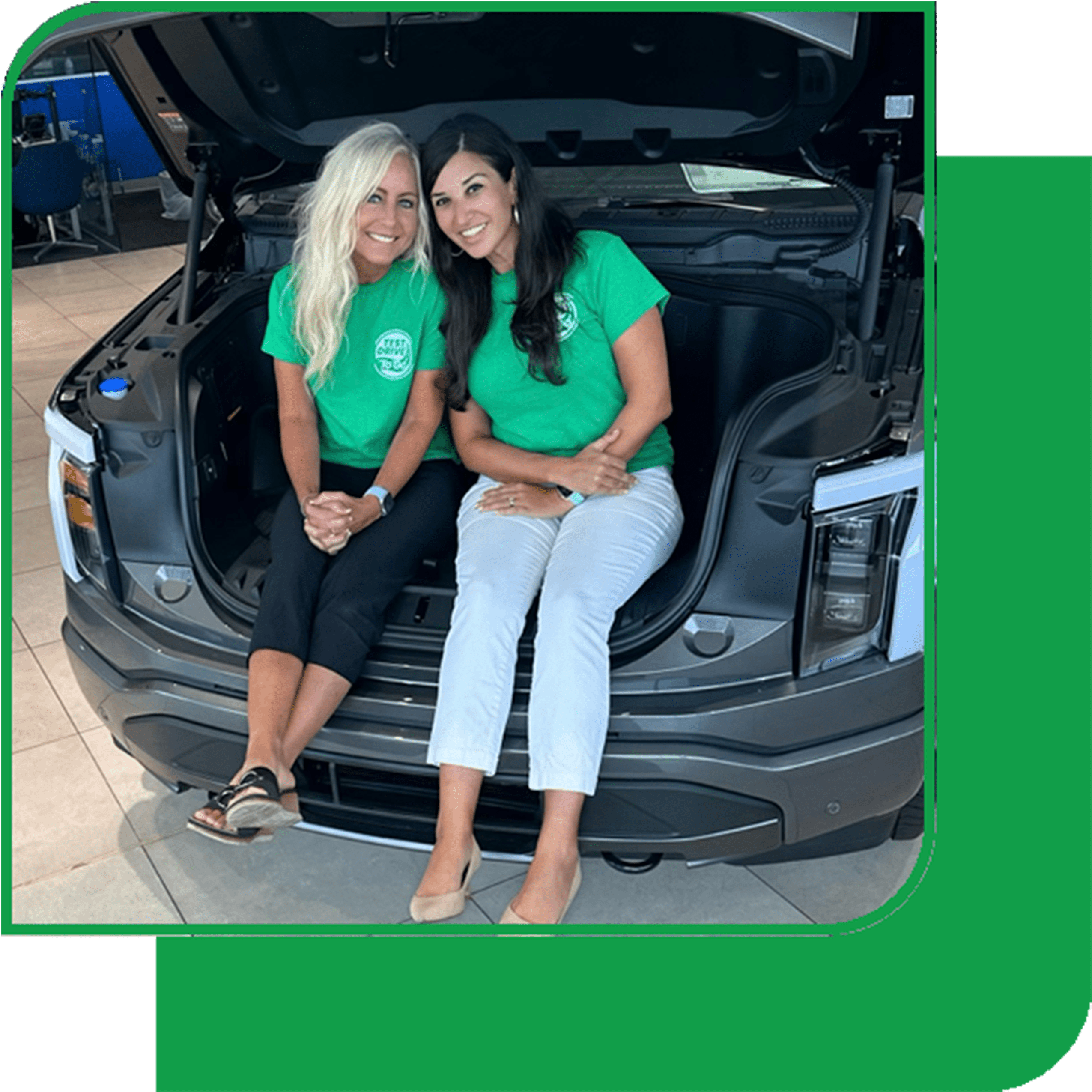 Angie and Khalida in the trunk of a car